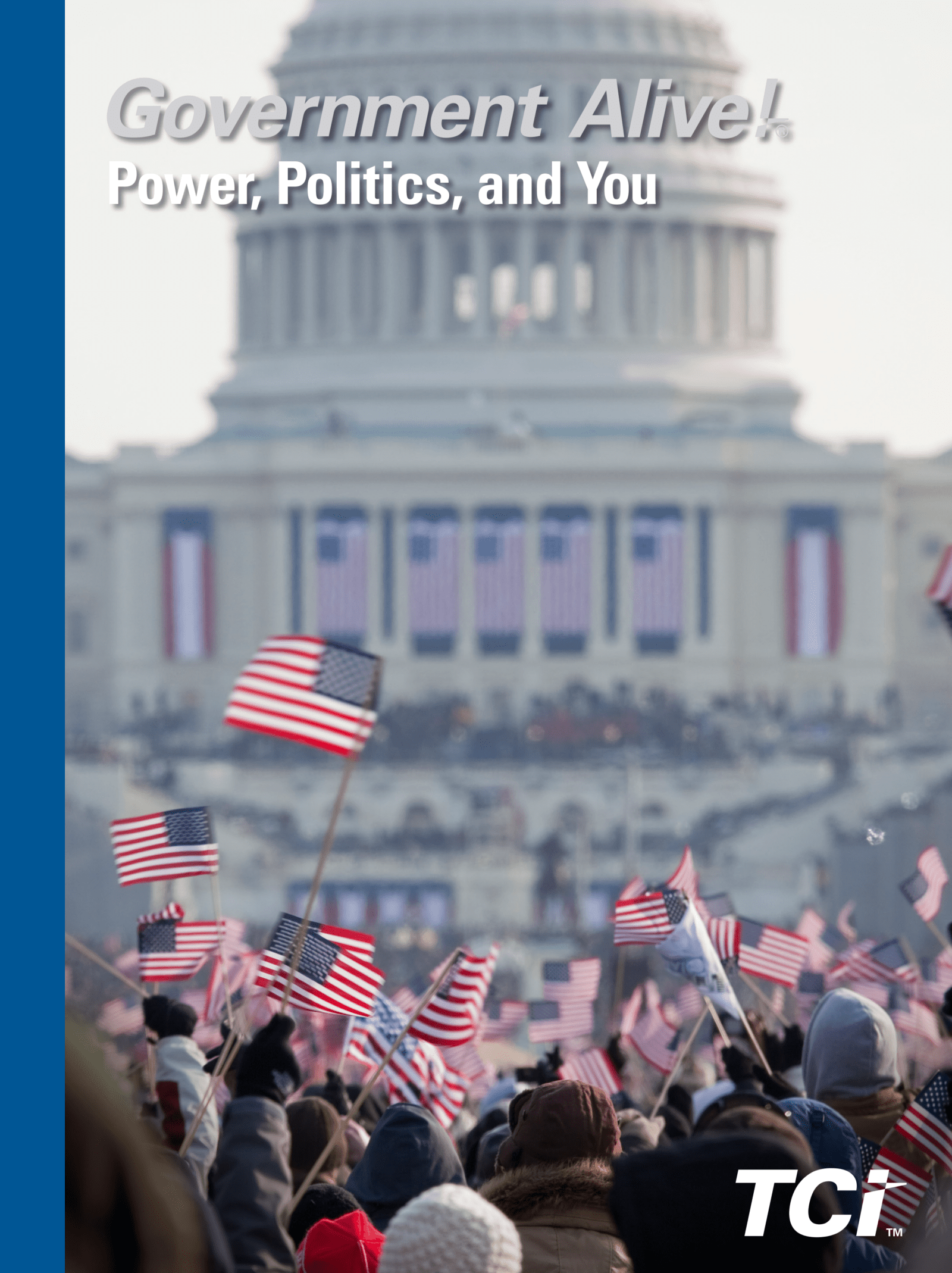 A crowd waves American flags near the U.S. Capitol, decorated with flags, during a public event.