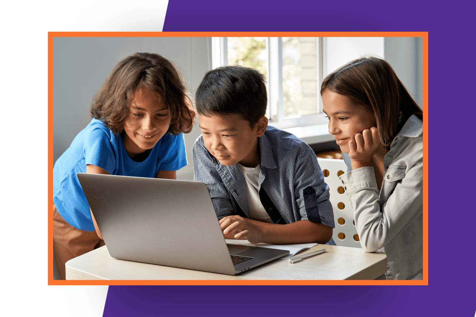 Three children looking at a laptop screen together.