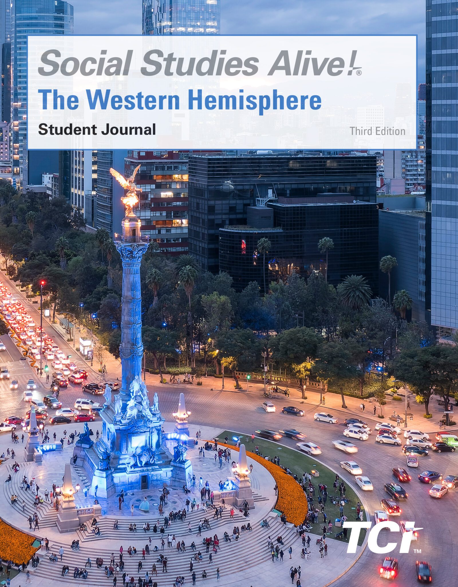 Busy city roundabout with a tall monument in the center, surrounded by cars, trees, and modern buildings at dusk.