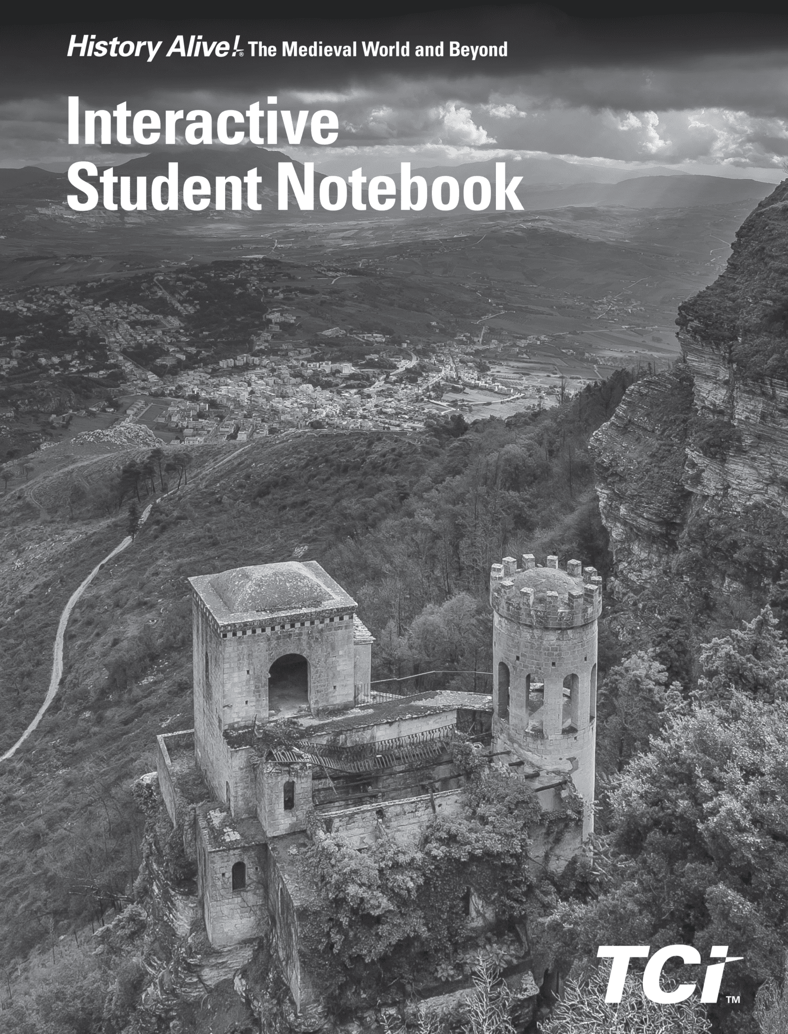 Old stone tower on a hill overlooks a valley and distant town under cloudy skies; Interactive Student Notebook text.