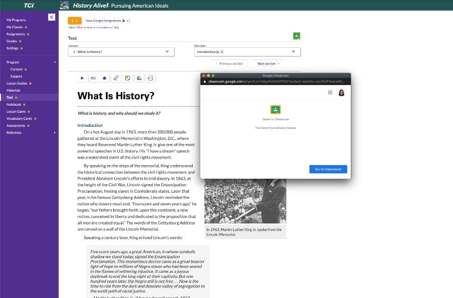 A computer screen shows a digital history textbook and a pop-up for Google Classroom over the text.