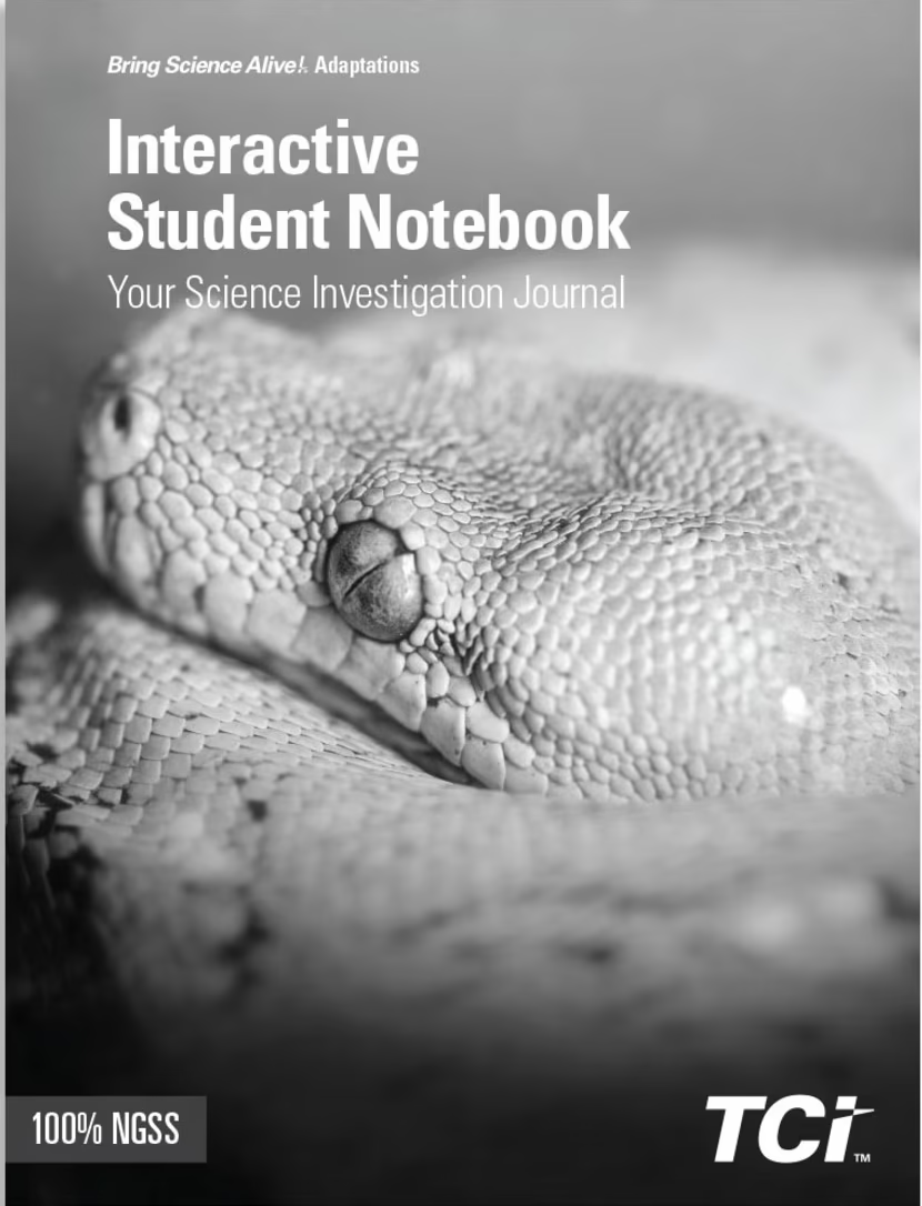 Close-up of a snake on the cover of a science notebook titled Interactive Student Notebook by TCI.