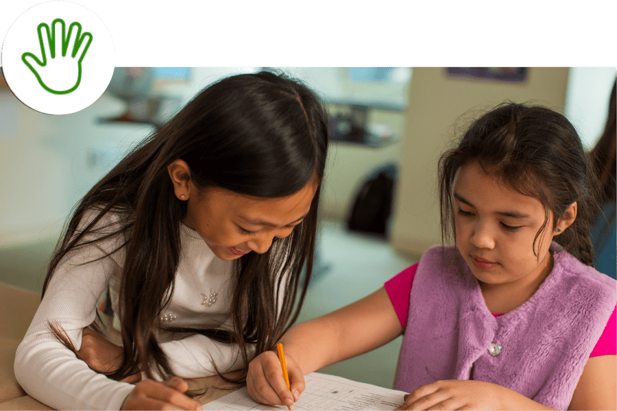 two students exploring tools